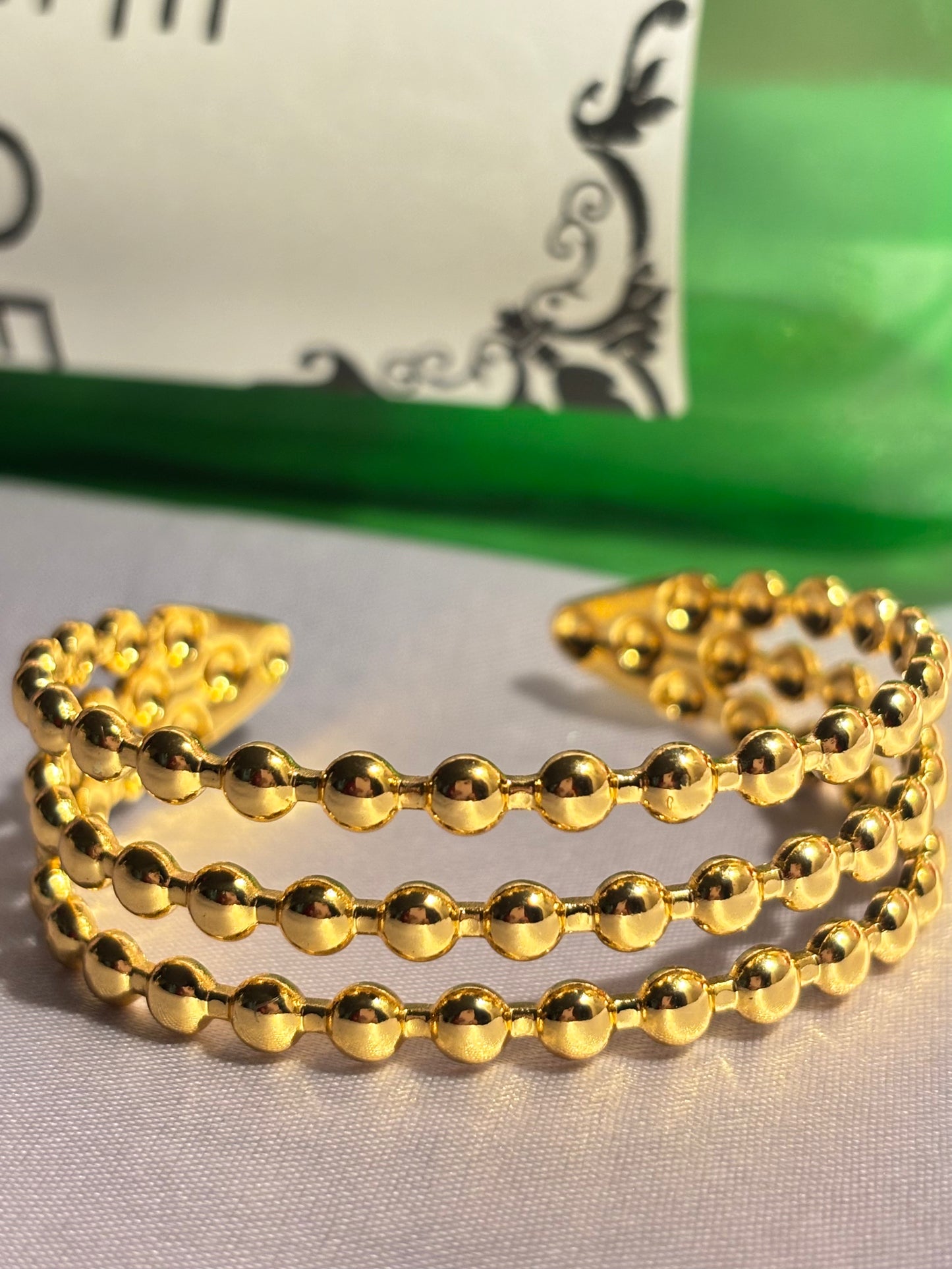 The Maya Caviar Triple-Row Cuff
