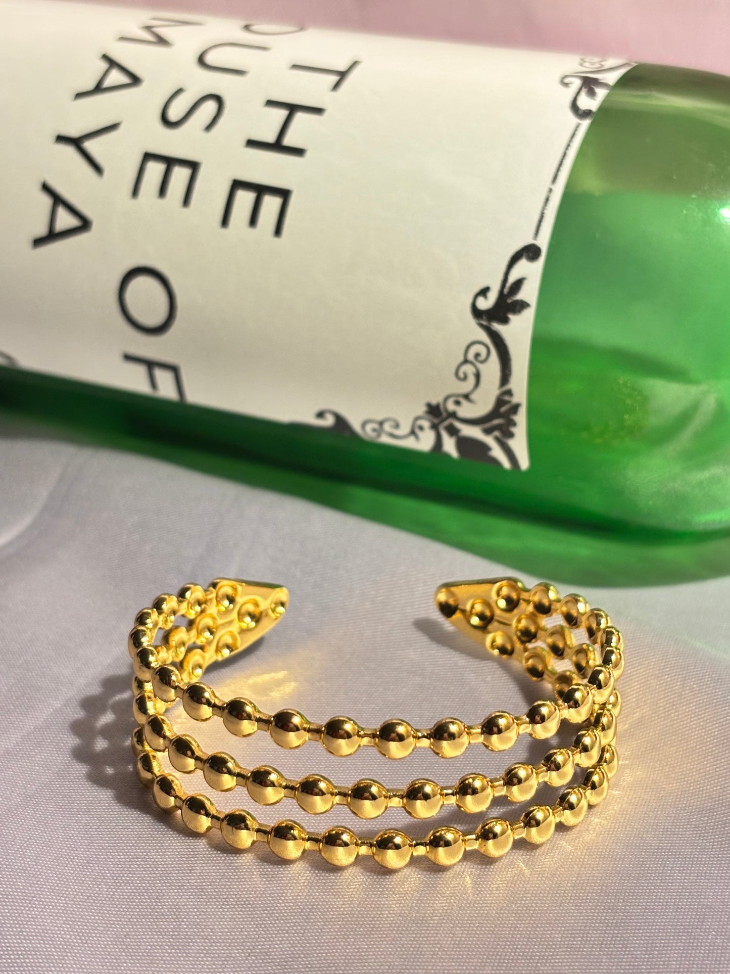 The Maya Caviar Triple-Row Cuff