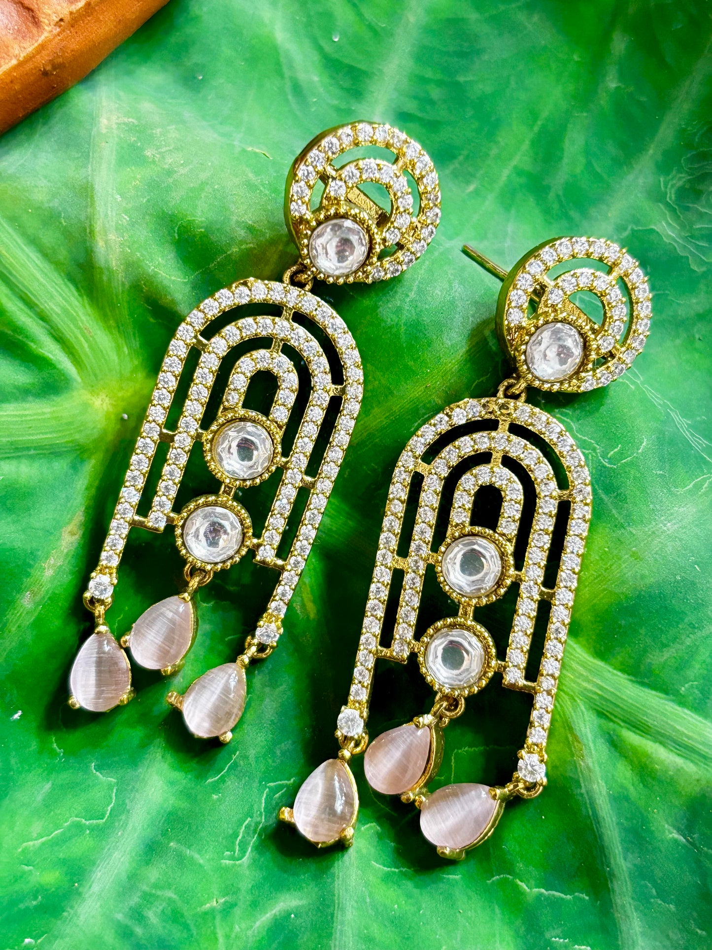 Maya Gold Geometric Arch Statement Earrings with Kundan Centers and Pink Teardrop Dangles